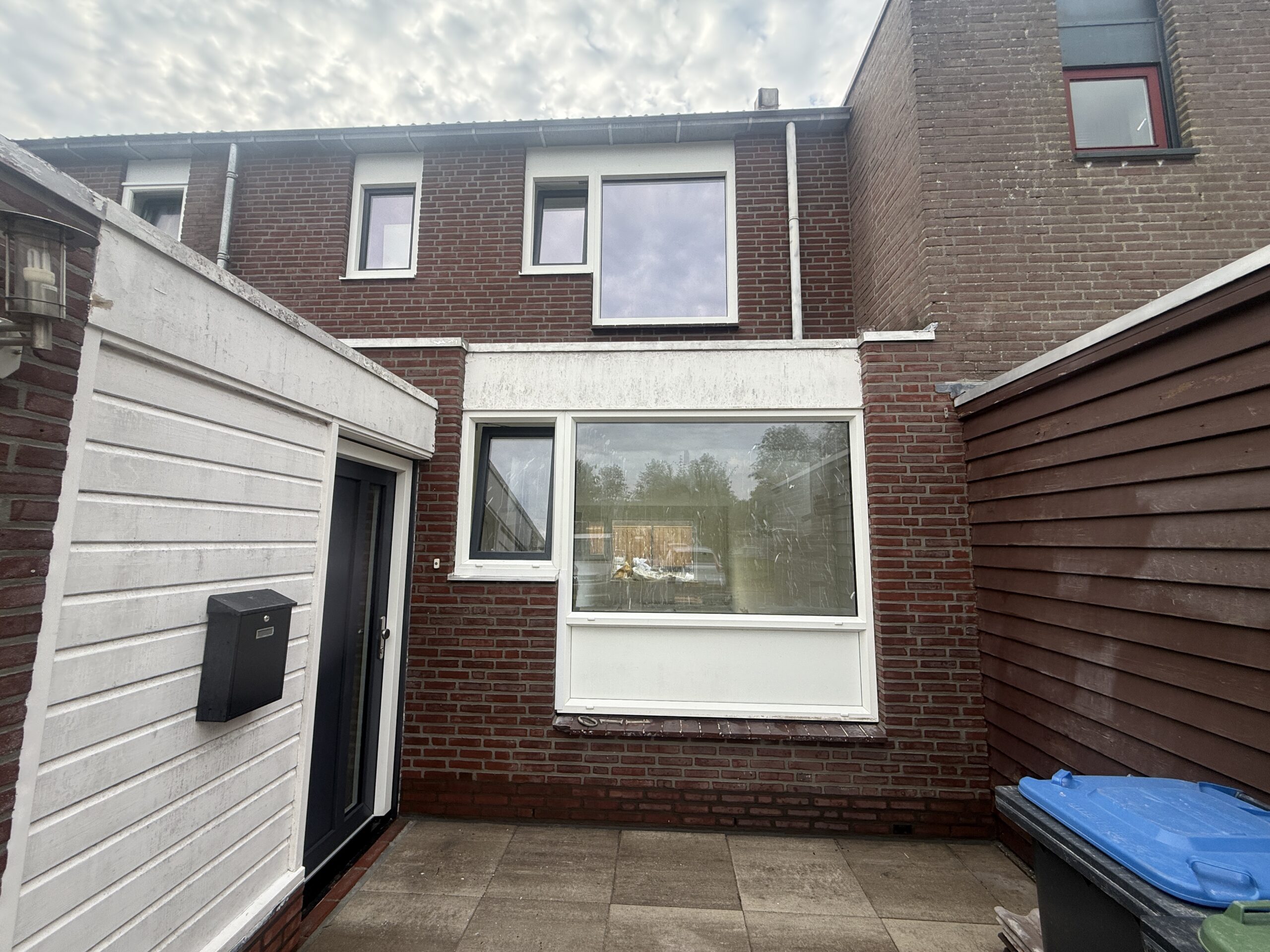 Voegwerk aan woning en tuinmuur · Project 1